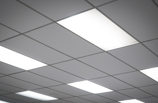 White ceiling with neon light bulbs